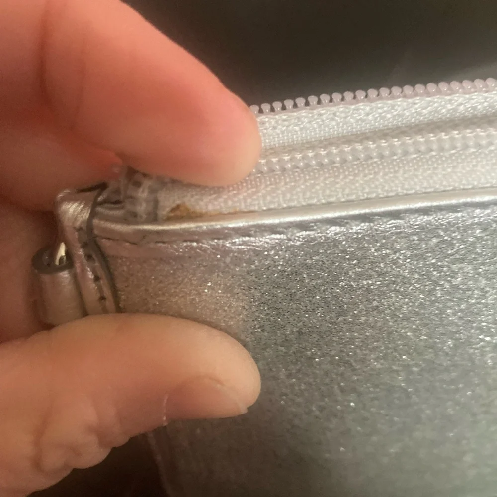 Coach Vintage glittery silver skinny zip wristlet wallet. Good used condition